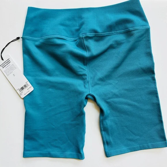 ALO Yoga Women's Seamless High Waist Ribbed Biker Shorts in Blue Splash - Picture 2 of 3